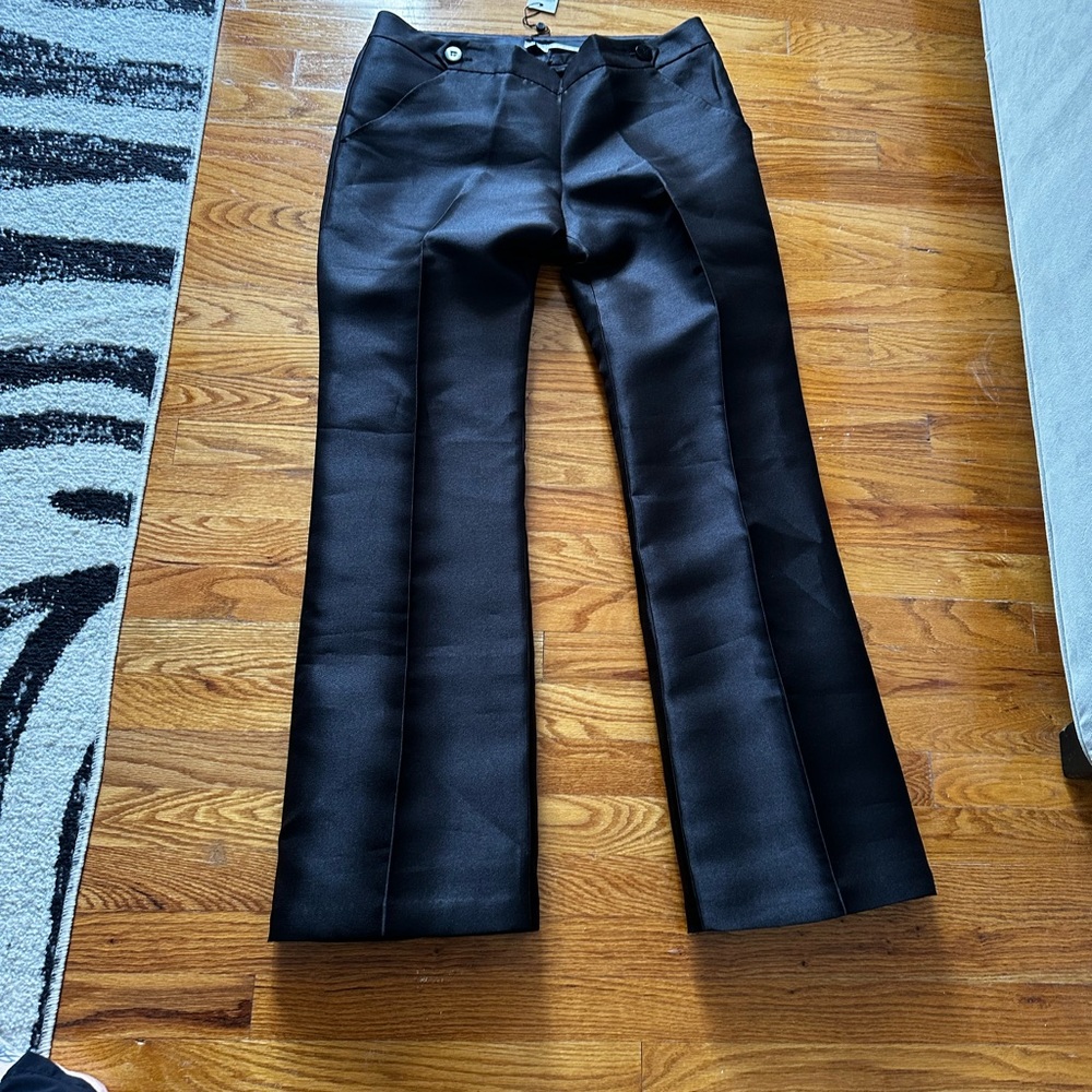 Black  Stralght-Leg
Pant-- has a shine to it